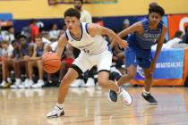 Las Vegas Knicks' Anthony Swift (5), left, looks to make a play under pressure from U.T.U. Gori ...