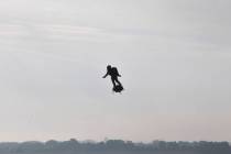Franky Zapata, a 40-year-old inventor, takes to the air in Sangatte, Northern France, at the st ...