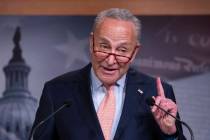 Senate Minority Leader Chuck Schumer, D-N.Y., talks Thursday, Aug. 1, 2019, to reporters at the ...
