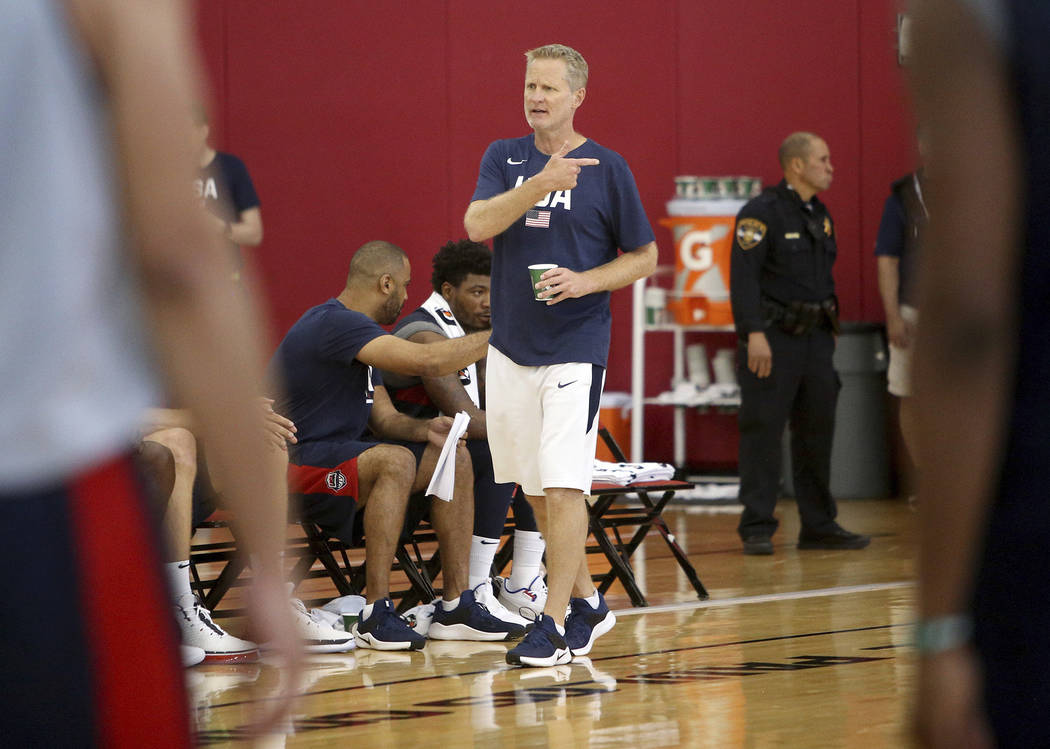 Asst. Coach Steve Kerr, of the Golden State Warriors, addresses players at practice for the USA ...