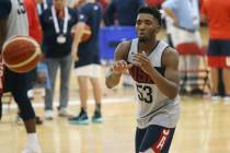 Utah Jazz guard Donovan Mitchell (53) reaches for a pass during the Team USA training camp at U ...