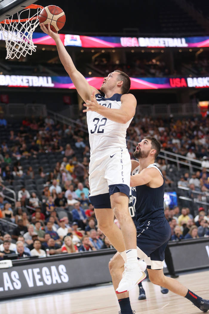 USA Men's National Team White guard Pat Connaughton (32) goes up for a shot against pressure fr ...