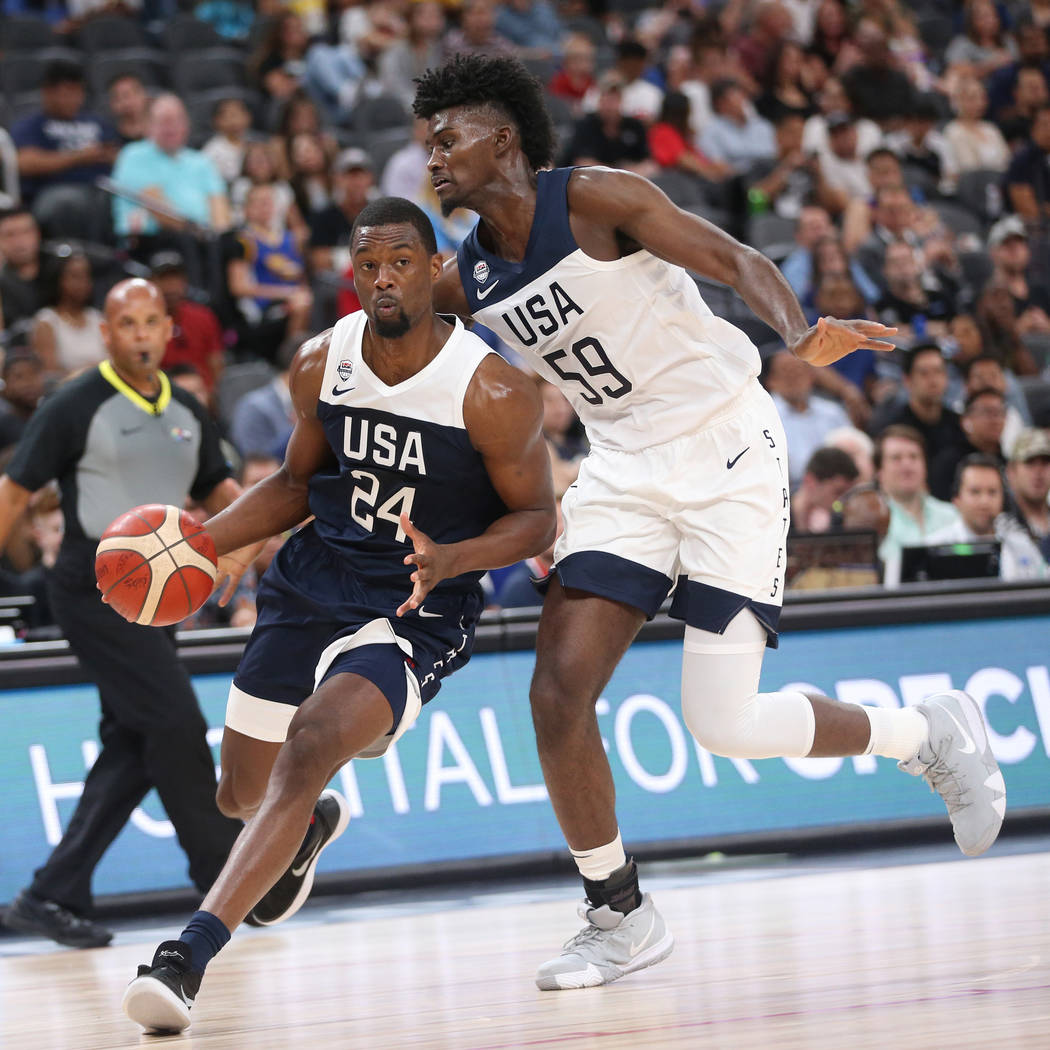 USA Men's National Team Blue Harrison Barnes (24) dribbles the ball under pressure from USA Men ...