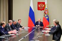 Russian President Vladimir Putin, center, chairs a Security Council meeting in the Kremlin in M ...