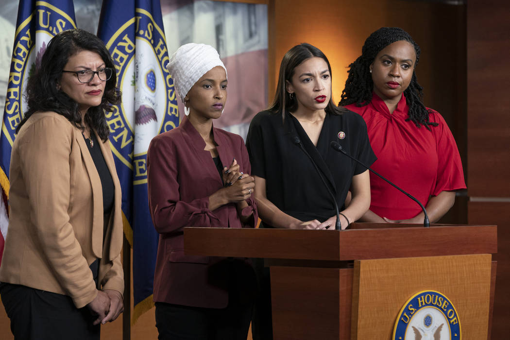 FILE - In this July 15, 2019, file photo, from left, Rep. Rashida Tlaib, D-Mich., Rep. Ilhan Om ...