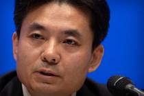 Yang Guang, spokesman for the Chinese Cabinet's Hong Kong and Macao Affairs Office, speaks duri ...