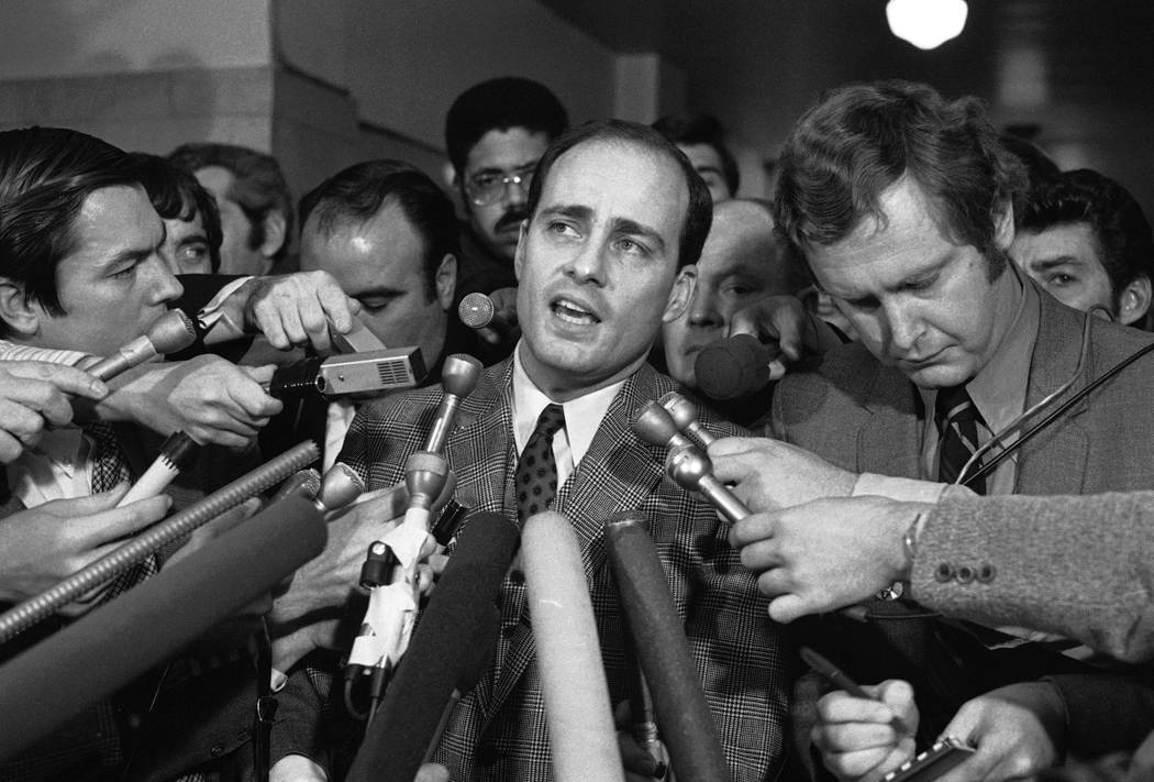 In a Jan. 26, 1971, file photo, Manson trial chief prosecutor Vincent Bugliosi talks with repor ...