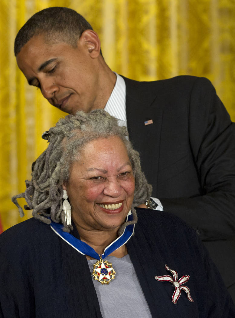 President Barack Obama awards author Toni Morrison with a Medal of Freedom during a ceremony in ...