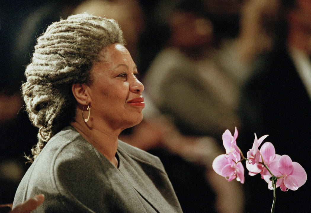 Toni Morrison holds an orchid at the Cathedral of St. John the Divine in New York, April 5, 199 ...