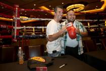 Nevada Boxing Hall of Fame inductee Wayne McCullough, left, visits with fan Alvino Aguilera of ...