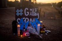 Candles burn at a makeshift memorial for Gilroy Garlic Festival shooting victims outside the fe ...