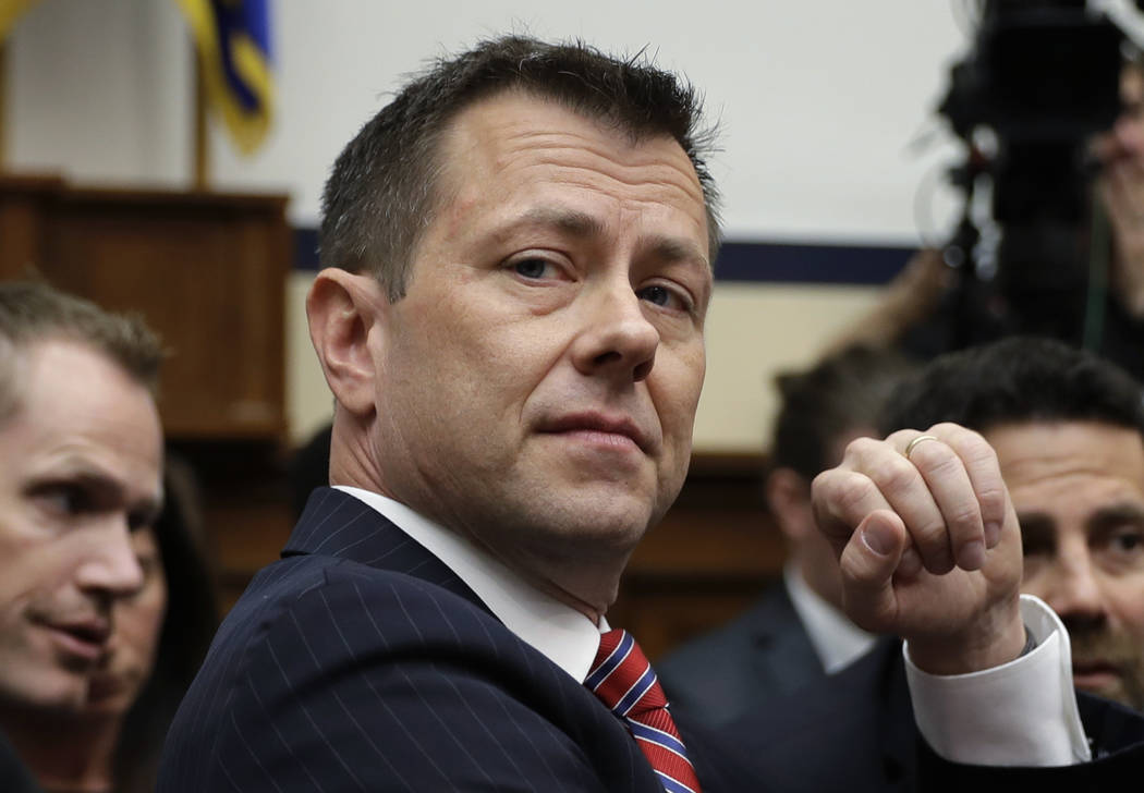 FILE - In this July 12, 2018, file photo, FBI Deputy Assistant Director Peter Strzok is seated ...