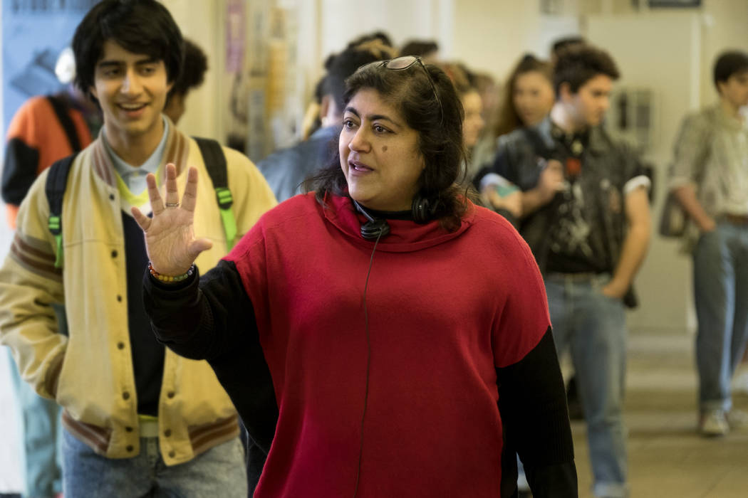 Viveik Kalra, left, and director Gurinder Chadha on the set of "Blinded by the Light." (Nick W ...