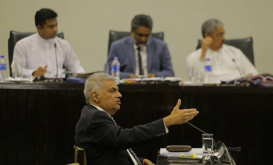 Sri Lankan Prime Minister Ranil Wickremesinghe testifies in front of a parliamentary committee ...