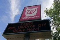 Signage is shown at a Walgreens location in Mebane, N.C., Tuesday, June 25, 2019. (AP Photo/Ger ...