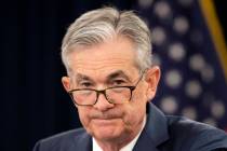 In a July 31, 2019, photo, Federal Reserve Chairman Jerome Powell speaks during a news conferen ...
