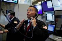 Trader Jonathan Mueller works on the floor of the New York Stock Exchange on Aug. 6, 2019. (AP ...