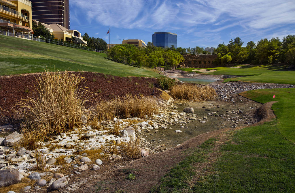 A stream and waterfall feature are shown under construction at Wynn Golf Club on Tuesday, July ...