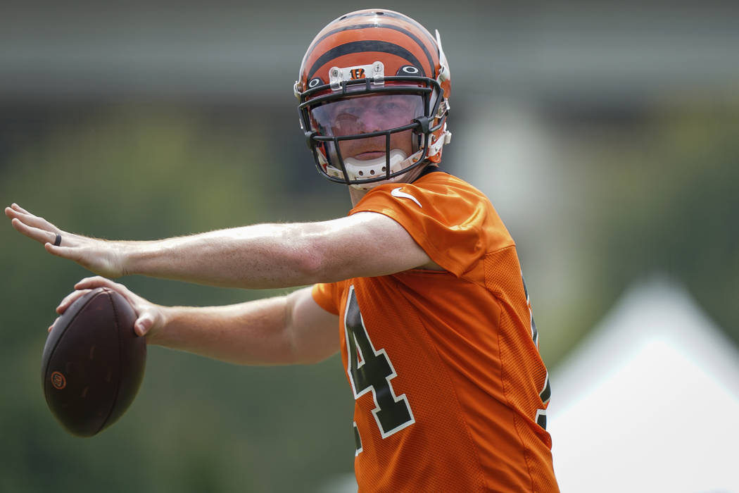 Cincinnati Bengals quarterback Andy Dalton (14) throws the ball during NFL football training ca ...