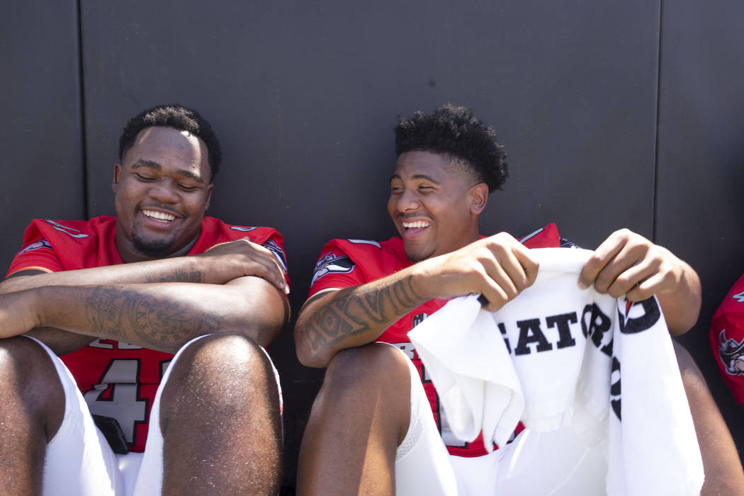 UNLV Rebels tight end Jamaal Neal (41), left, and tight end Noah Bean (11) wait in the shade du ...