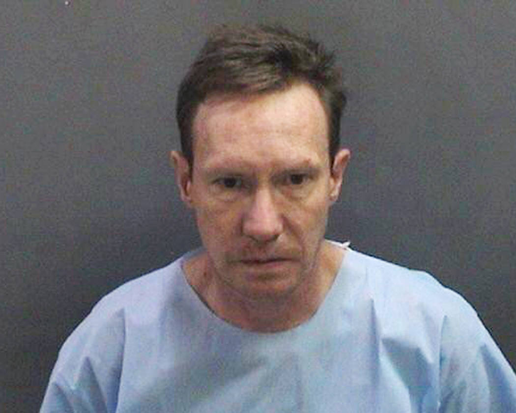 This undated booking photo provided by the Newport Beach, Calif., Police Department shows Peter ...