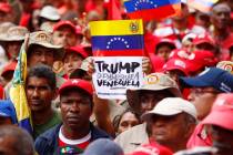 Members of the Bolivarian militia attend a protest against U.S. sanctions on Venezuela, in Cara ...