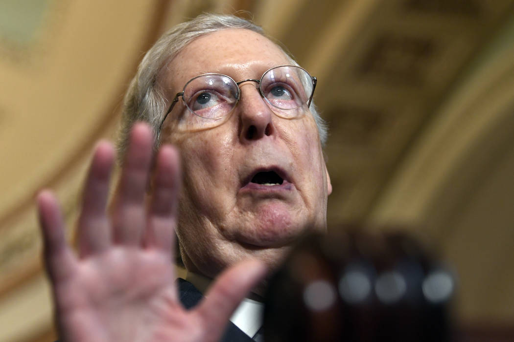 In a July 23, 2019, photo, Senate Majority Leader Mitch McConnell of Ky., speaks to reporters o ...