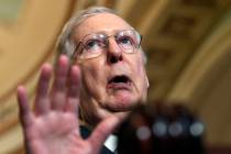 In a July 23, 2019, photo, Senate Majority Leader Mitch McConnell of Ky., speaks to reporters o ...