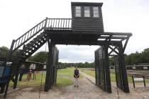 A July 18, 2017, file photo shows the wooden main gate leading into the former Nazi German Stut ...