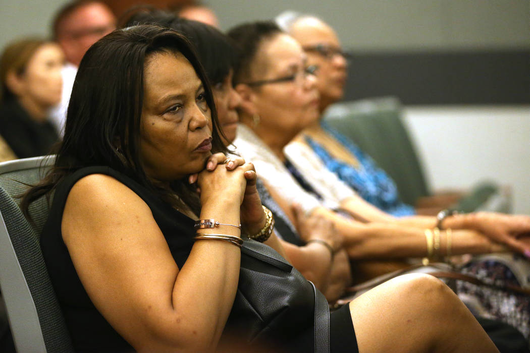 Rita Harris, left, listens to arguments for the case involving her cousin Paul Browning, who sa ...