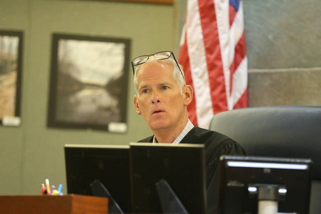 Judge Douglas W. Herndon listens to arguments for the case involving Paul Browning, who sat on ...