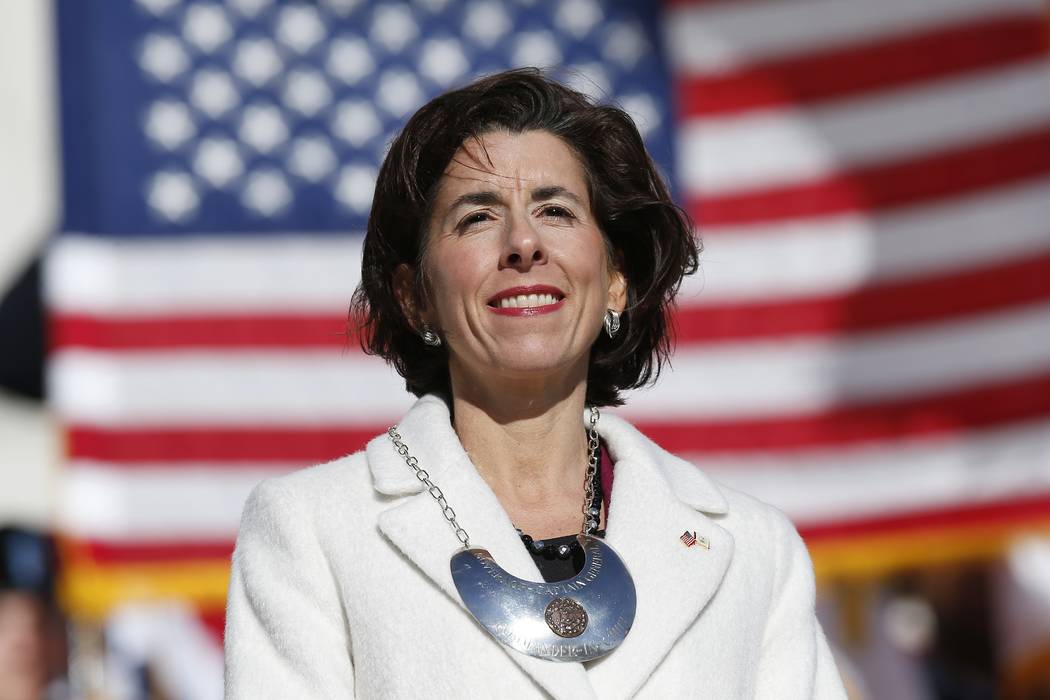 Rhode Island Gov. Gina Raimondo stands on the State House steps after taking the oath of office ...