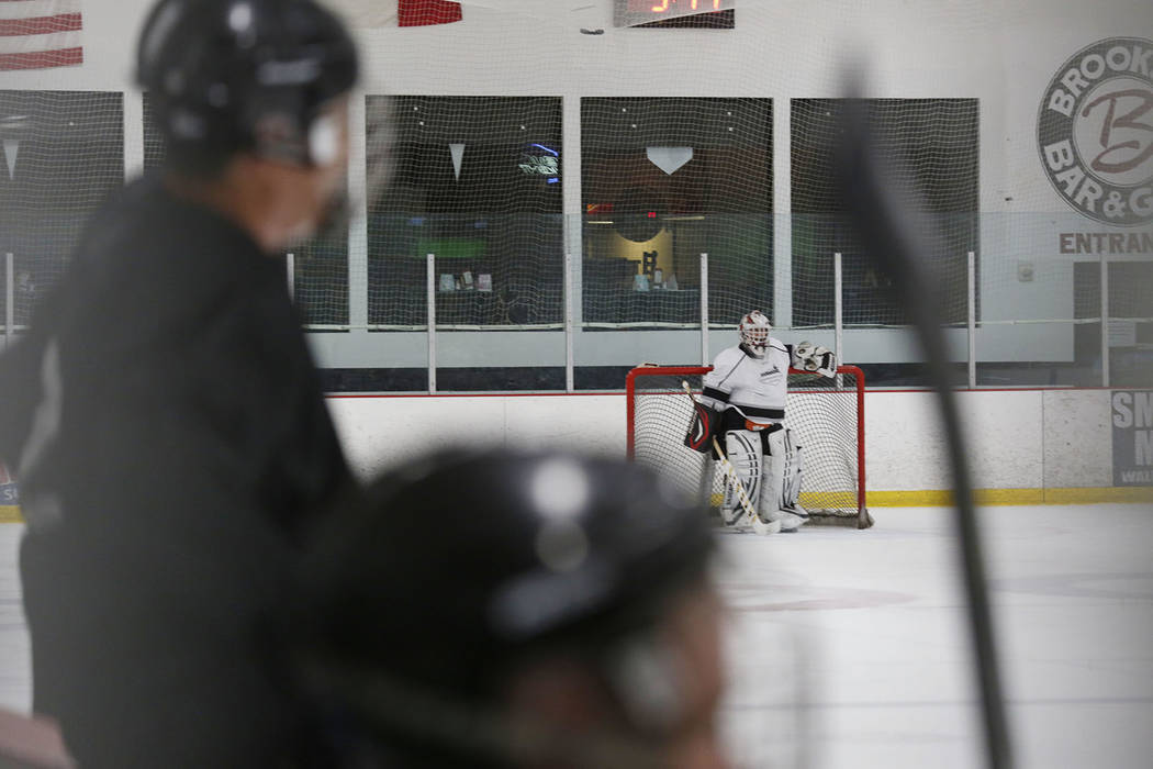 Goalie Dave Holm, 76, during Ronnie's Hockey Club, a pickup ice hockey league at the Las Vegas ...