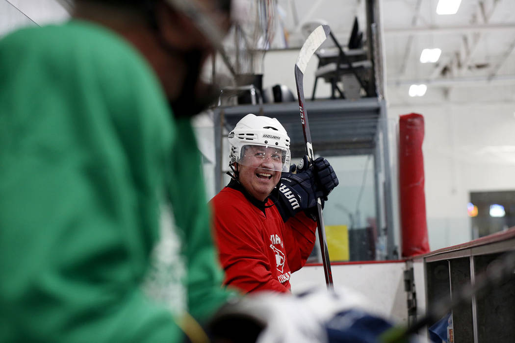 Player Sean Glenn Burgess waits to go back onto the ice during Ronnie's Hockey Club, a pickup ...