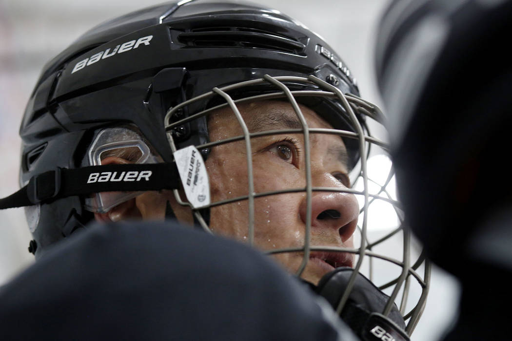 Player Arthur Wong comes off of the ice during Ronnie's Hockey Club, a pickup ice hockey league ...