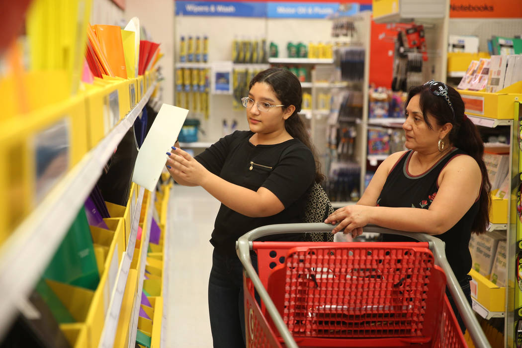 Edith Del Aguila, left, 12, a student at K.O. Knudson Middle School, with her mother Rosario Ga ...