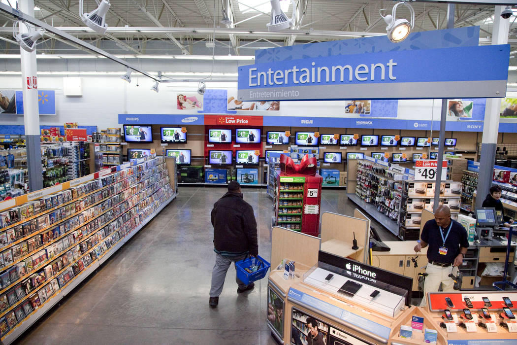 In a Dec. 15, 2010, file photo, a view of the entertainment section of a Walmart store is seen ...