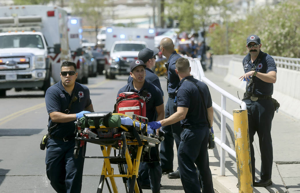FILE - In this Aug. 3, 2019 file photo, El Paso Fire Medical personnel arrive at the scene of a ...
