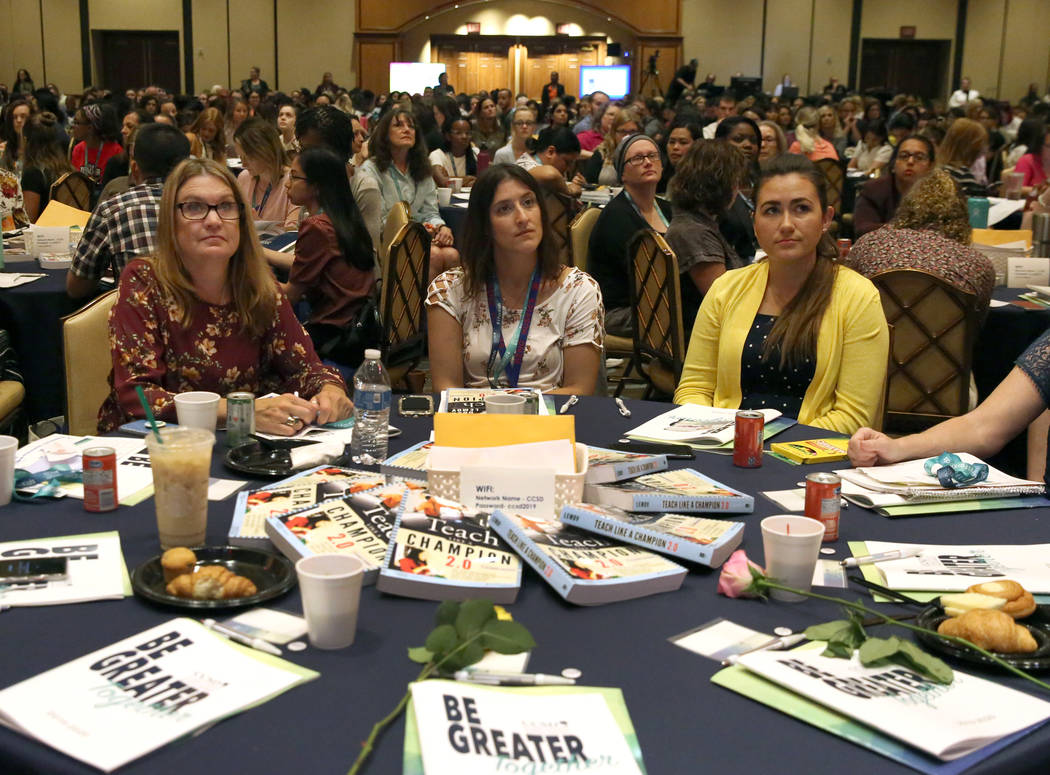 Mikki Cardella, left, Sarah Paletz, center, and Zoe Crow attend the Clark County School Distric ...