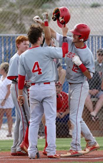 Arbor View’s Payton Brooks, left, and Brad Stone (4), who played for Mountain Ridge, celebrat ...