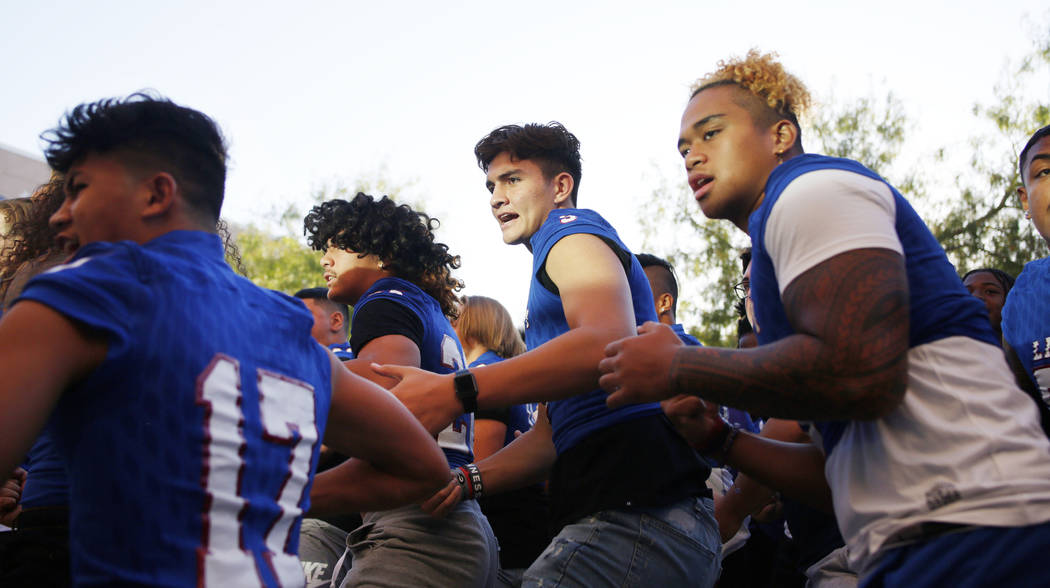 Members of the Liberty High School football team preforms a ceremonial Haka for the first day o ...