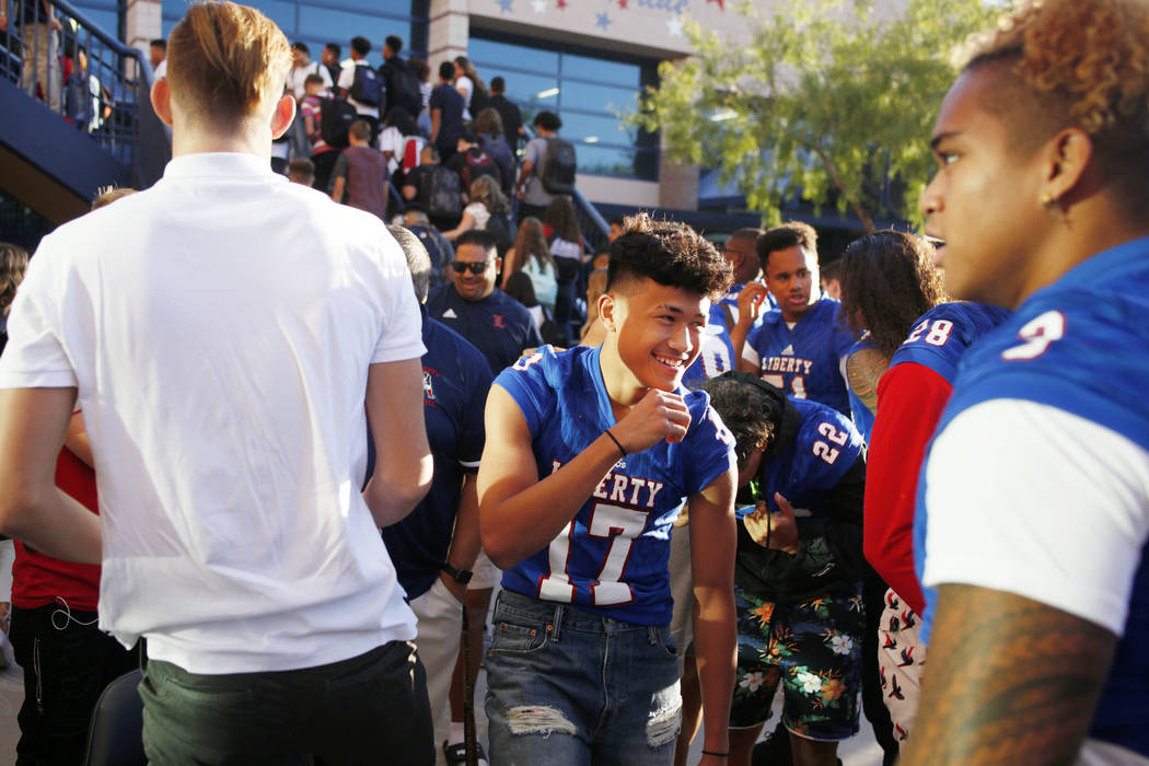 Liberty High School students are dismissed to their homerooms on the first day of school, Monda ...
