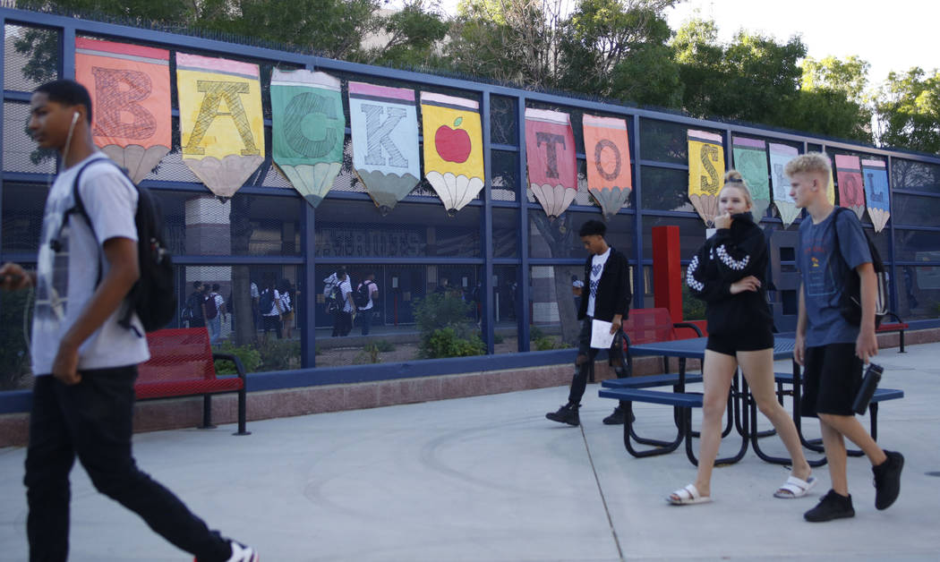 Students find their homerooms on the first day of school at Liberty High School in Henderson, M ...