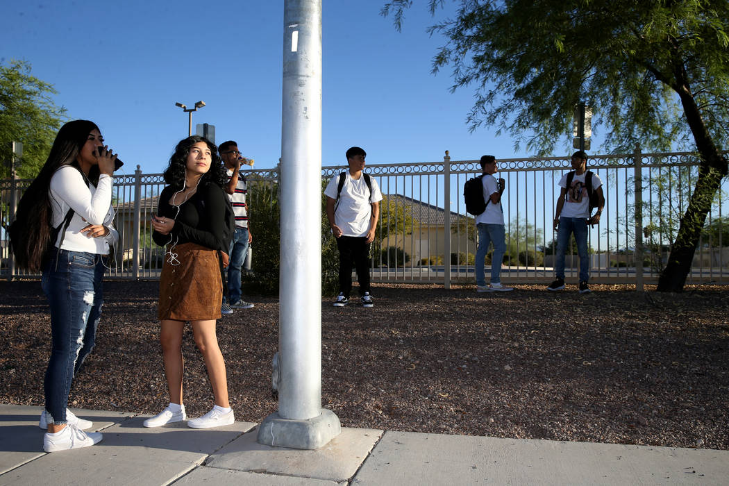 Sunrise Mountain High School senior Azaleah Saldana, left, and her sister Nevaeh Saldana, a sop ...