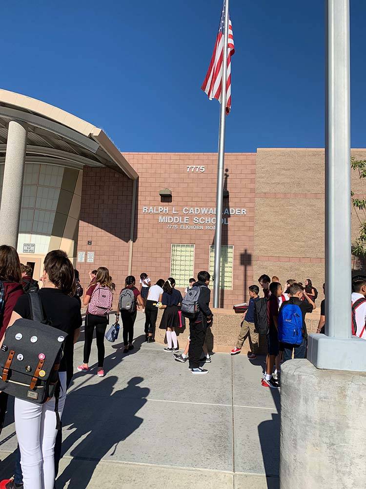 Cadwallader Middle School students arrive for the first day of classes, Monday, Aug. 12, 2019. ...