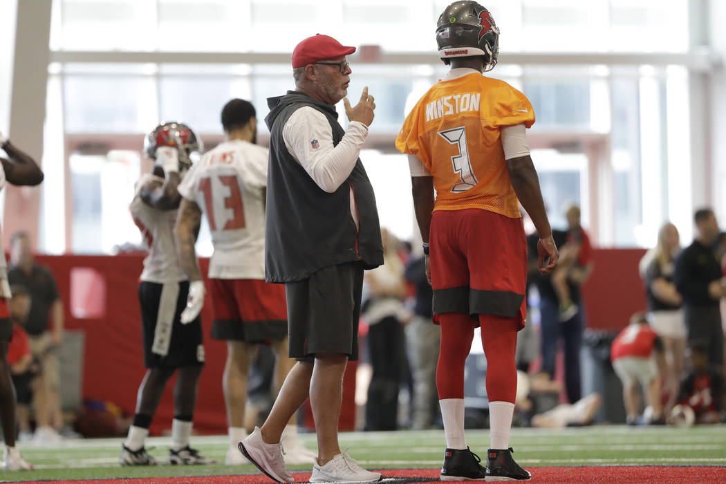 Tampa Bay Buccaneers head coach Bruce Arians talks to quarterback Jameis Winston (3) during an ...