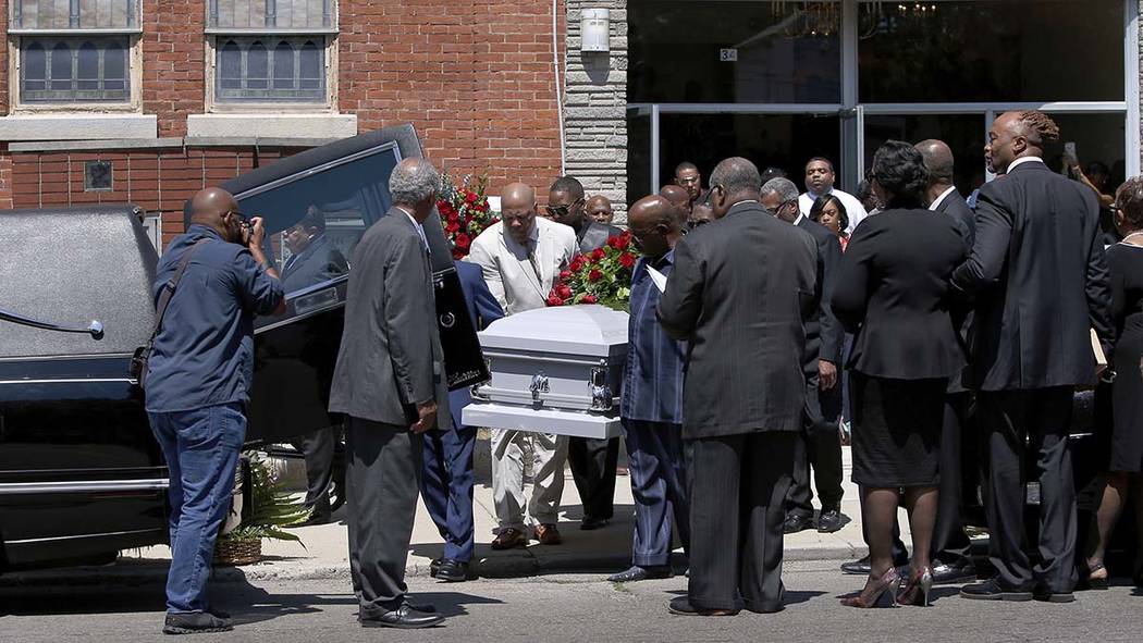 Derrick Fudge's casket is loaded into a hearse on Saturday, Aug. 10, 2019, outside a church in ...