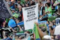 In this July 21, 2019, photo, a sign that reads "Anti-Facist Always Seattle Anti-Racist&qu ...