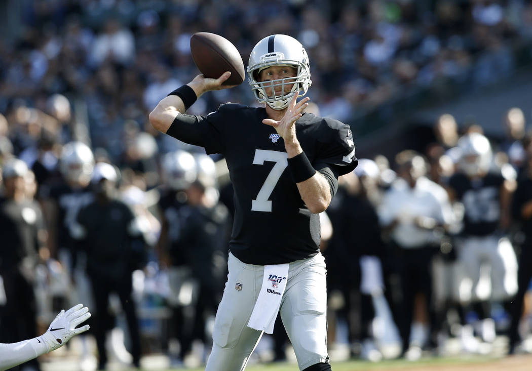 Oakland Raiders quarterback Mike Glennon throws a pass against the Los Angeles Rams during the ...