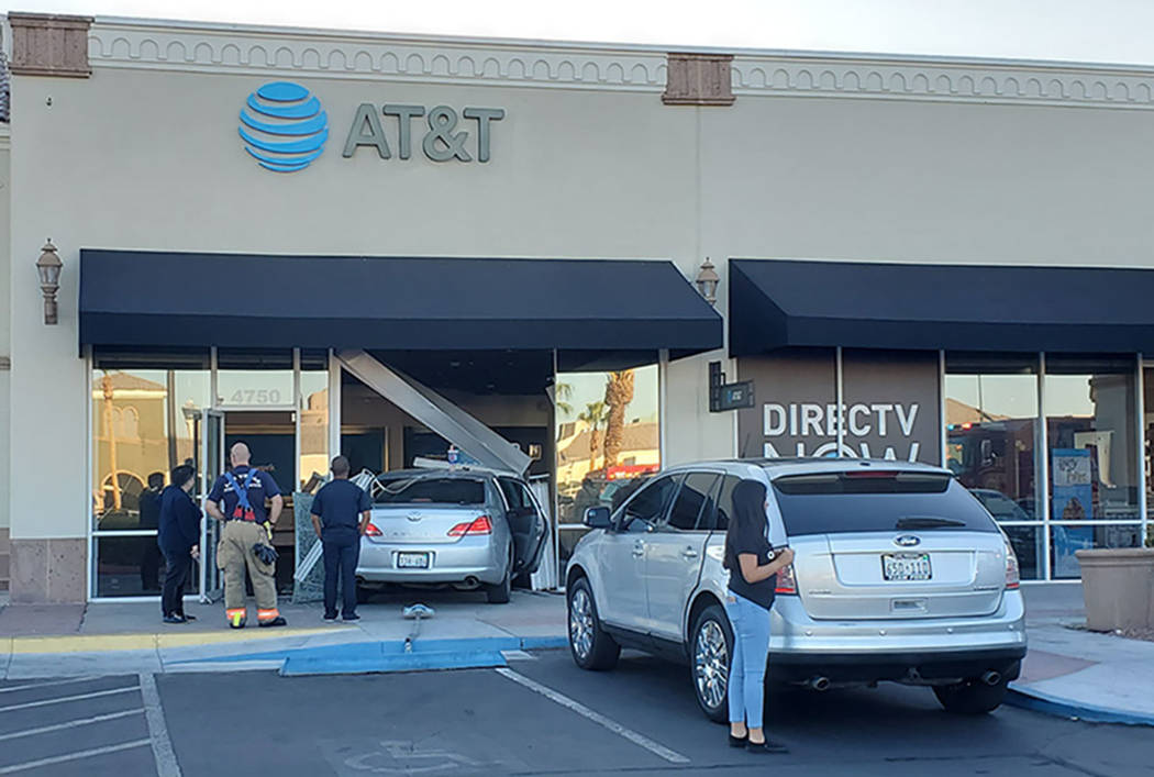 A vehicle is seen inside the AT&T store at 4750 W. Sahara Ave. in Las Vegas on Saturday, Aug. 1 ...